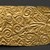 Scythian. <em>Plaque with spirals and palmettes</em>, ca. 400-300 B.C.E. Gold, 1 3/8 x 6 11/16 in. (3.5 x 17 cm). Brooklyn Museum, Gift of Rosemarie Haag Bletter and Martin Filler, 2004.99. Creative Commons-BY (Photo: Brooklyn Museum, 2004.99_detail06_PS20.jpg)