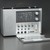 Dieter Rams (German, born 1932). <em>World Receiver T 1000 Radio</em>, 1963. Aluminum, plastic, leather, 14 1/4 x 5 1/4 in. (36.2 x 13.3 cm). Brooklyn Museum, Gift of Jan Staller, 2006.9. Creative Commons-BY (Photo: Brooklyn Museum, 2006.9_open_PS1.jpg)