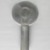 Queens Art Pewter, Ltd. (1930-2000). <em>Brush</em>, ca. 1935. Pewter, bristles, cellulous, 8 5/8 x 4 3/8 x 1 1/2 in. (21.9 x 11.1 x 3.8 cm). Brooklyn Museum, Bequest of H. Randolph Lever, by exchange, 2007.21.3. Creative Commons-BY (Photo: Brooklyn Museum, 2007.21.3_back_PS6.jpg)