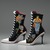 Teri Greeves (Kiowa, born 1970). <em>Great Lakes Girls</em>, 2008. Glass beads, bugle beads, Swarovski crystals, sterling silver stamped conchae, spiny oyster shell cabochons, canvas high-heeled sneakers, each: 11 1/2 x 9 x 3 in. (29.2 x 22.9 x 7.6 cm). Brooklyn Museum, Gift of Stanley J. Love, by exchange, 2009.1a-b. © artist or artist's estate (Photo: Brooklyn Museum, 2009.1a-b_side2_PS2.jpg)