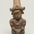 Maya. <em>Whistle in the Form of a Seated Male Figure</em>, 600-900. Ceramic, pigment (white, black, and blue), 5 × 2 1/4 × 3 in. (12.7 × 5.7 × 7.6 cm). Brooklyn Museum, Gift in memory of Frederic Zeller, 2009.2.13. Creative Commons-BY (Photo: Brooklyn Museum, 2009.2.13_overall_PS11.jpg)