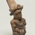 Maya. <em>Whistle in the Form of a Seated Male Figure</em>, 600-900. Ceramic, pigment (white, black, and blue), 5 × 2 1/4 × 3 in. (12.7 × 5.7 × 7.6 cm). Brooklyn Museum, Gift in memory of Frederic Zeller, 2009.2.13. Creative Commons-BY (Photo: Brooklyn Museum, 2009.2.13_threequarter_right_PS11.jpg)