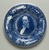 The Rowland & Marsellus Company (1893-1938). <em>Charles Dickens Plate</em>, Registered 1904, Made: early 20th century. Glazed earthenware, 1 1/8 x 11 in. (2.9 x 27.9 cm). Brooklyn Museum, Gift of Pat Nichols in honor of Joanne Leshen, 2009.77.1. Creative Commons-BY (Photo: Brooklyn Museum, 2009.77.1_front_PS11.jpg)