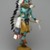 Orin Poley. <em>Kachina Doll (Sakwahote)</em>, 1960-1970. Cottonwood root, acrylic pigment, hide, feathers, shell, fur,  turquioise, metal, 17 3/4 x 6 x 9 in. (45.1 x 15.2 x 22.9 cm). Brooklyn Museum, Gift of Edith and Hershel Samuels, 2010.6.1. Creative Commons-BY (Photo: Brooklyn Museum, 2010.6.1_threequarter_right_PS2.jpg)