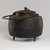  <em>Kettle and Lid</em>, 19th century. Cast-iron, 10 1/4 x 10 3/4 in. (26 x 27.3 cm). Brooklyn Museum, Gift of Dr. and Mrs. John P. Lyden, 2010.85.16a-b. Creative Commons-BY (Photo: Brooklyn Museum, 2010.85.16a-b_overall02_PS20.jpg)