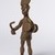 Ldamie (Dan, flourished 1920s–1930s). <em>Male Figure with Drum</em>, early 20th century. Copper alloy, 8 11/16 x 3 1/8 x 3 3/8 in. (22 x 8 x 8.5 cm). Brooklyn Museum, Gift of Tom and Anna Boyle, 2012.75.8. Creative Commons-BY (Photo: Brooklyn Museum, 2012.75.8_threequarter_PS22.jpg)