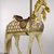 Possibly Marcus Charles Illions (American, born Lithuania, 1866-1950). <em>Carousel Horse, Southern Belle</em>, ca. 1910. Wood, pigment, gilding, glass, metal, Approximate dimensions of horse only: 58 x 19 x 58 in. (147.3 x 48.3 x 147.3 cm). Brooklyn Museum, Bequest of Marianne S. Stevens, 2013.49a-e. Creative Commons-BY (Photo: Brooklyn Museum, 2013.49a-e_view2_PS9.jpg)