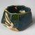 Kakurezaki Ryuichi (Japanese, born 1950). <em>Tea Bowl</em>, 2008. Stoneware with green oribe glaze, 4 × 6 1/2 × 5 in. (10.2 × 16.5 × 12.7 cm). Brooklyn Museum, Gift of Shelly and Lester Richter, 2013.83.26. Creative Commons-BY (Photo: Brooklyn Museum, 2013.83.26_view1_PS11.jpg)