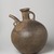  <em>Spouted Vessel</em>, 1st millennium B.C.E. Clay, slip, height: 9 13/16 in. (25 cm). Brooklyn Museum, Gift of the Arthur M. Sackler Foundation, NYC, in memory of James F. Romano, 2015.65.22. Creative Commons-BY (Photo: Brooklyn Museum, 2015.65.22_view01_PS11.jpg)