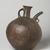  <em>Spouted Vessel</em>, 1st millennium B.C.E. Clay, slip, height: 9 13/16 in. (25 cm). Brooklyn Museum, Gift of the Arthur M. Sackler Foundation, NYC, in memory of James F. Romano, 2015.65.22. Creative Commons-BY (Photo: Brooklyn Museum, 2015.65.22_view02_PS11.jpg)