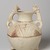  <em>Twin-Spouted Vessel with Theriomorphic Handles</em>, 3rd-2nd century B.C.E. Clay, slip, 9 13/16 x Diam. 6 11/16 in. (25 x 17 cm). Brooklyn Museum, Gift of the Arthur M. Sackler Foundation, NYC, in memory of James F. Romano, 2015.65.3. Creative Commons-BY (Photo: Brooklyn Museum, 2015.65.3_view01_PS11.jpg)