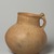  <em>Globular Jug with Handle</em>, 1000-400 B.C.E. Clay, slip, 6 1/8 x Diam. 6 5/16 in. (15.5 x 16 cm). Brooklyn Museum, Gift of the Arthur M. Sackler Foundation, NYC, in memory of James F. Romano, 2015.65.6. Creative Commons-BY (Photo: Brooklyn Museum, 2015.65.6_view02_PS11.jpg)