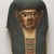  <em>Cartonnage Mummy Mask</em>, ca. 330 B.C.E.-50 C.E. Gesso, gilding, pigment, gauze or linen, 14 3/16 × 10 13/16 × 8 11/16 in. (36 × 27.5 × 22 cm). Brooklyn Museum, Bequest of Harold and Mildred Jacobs, 2022.1.1 (Photo: Brooklyn Museum, 2022.1.1_PS11.jpg)