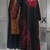 Palestinian. <em>Traditional Dress (Thobe)</em>, ca. 1930–1958. Indigo dyed linen, cotton, atlas silk, lace and silk embroidery, Length: 54 ½ in.  . Brooklyn Museum, Gift of Mr. and Mrs. J. Garrison Stradling, 2022.7.1. Creative Commons-BY (Photo: Brooklyn Museum, 2022.7.1_in_situ_01_PS20.jpg)