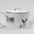 Sheila Bridges (American, born 1964). <em>Picnic Teapot</em>. Bone china, 3 13/16 × 4 5/8 × 10 1/4 in. (9.7 × 11.7 × 26 cm). Brooklyn Museum, Gift of Wedgwood© Fiskars UK Limited, 2023.34.6a-b (Photo: Brooklyn Museum, 2023.34.6a-b_side_right_PS20.jpg)