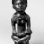 Yombe. <em>Figure of Mother and Child (Phemba)</em>, 19th century. Wood, 11 1/4 x 2 3/4in. (28.6 x 7cm). Brooklyn Museum, Museum Expedition 1922, Robert B. Woodward Memorial Fund, 22.1137. Creative Commons-BY (Photo: Brooklyn Museum, 22.1137_front_bw.jpg)