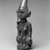 Yombe. <em>Female Figure Seated on Animal</em>, 19th century. Wood, seed pod, plastic beads, copper alloy, 12 x 4 x 3 3/4in. (30.5 x 10.2 x 9.5cm). Brooklyn Museum, Museum Expedition 1922, Robert B. Woodward Memorial Fund, 22.1141. Creative Commons-BY (Photo: Brooklyn Museum, 22.1141_acetate_bw.jpg)