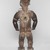 Kakongo artist. <em>Power Figure (Nkisi Nkondi)</em>, 19th century, with 20th century restoration. Wood, iron, glass, resin, kaolin, pigment, plant fiber, cloth, 33 7/8 x 13 3/4 x 11 in. (86 x 34.9 x 27.9 cm). Brooklyn Museum, Museum Expedition 1922, Robert B. Woodward Memorial Fund, 22.1421. Creative Commons-BY (Photo: , 22.1421_back_PS9.jpg)