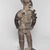 Kakongo artist. <em>Power Figure (Nkisi Nkondi)</em>, 19th century, with 20th century restoration. Wood, iron, glass, resin, kaolin, pigment, plant fiber, cloth, 33 7/8 x 13 3/4 x 11 in. (86 x 34.9 x 27.9 cm). Brooklyn Museum, Museum Expedition 1922, Robert B. Woodward Memorial Fund, 22.1421. Creative Commons-BY (Photo: , 22.1421_threequarter_right_PS9.jpg)