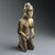 Yombe. <em>Kneeling Woman Holding a Pipe</em>, 19th century. Wood, pigment, glass mirror, fiber, copper alloy, 9 13/16 x 3 15/16 x 3 3/4 in. (25 x 10 x 9.5 cm). Brooklyn Museum, Museum Expedition 1922, Robert B. Woodward Memorial Fund, 22.1426. Creative Commons-BY (Photo: Brooklyn Museum, 22.1426_edited_version_SL1.jpg)