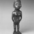 Kongo. <em>Standing Female Figure (Nkisi)</em>, 19th century. Wood, glass mirror, plastic beads, cotton cordage, applied materials, 9 x 2 3/4 x 2 1/2 in. (22.9 x 7.0 x 6.4 cm). Brooklyn Museum, Museum Expedition 1922, Robert B. Woodward Memorial Fund, 22.1444. Creative Commons-BY (Photo: Brooklyn Museum, 22.1444_threequarter_bw.jpg)