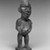 Vili. <em>Standing Male Figure (Nkonde)</em>, 19th century. Wood, resin, glass mirror, ferrous nails, 7 3/4 x 2 1/2 x 2in. (19.7 x 6.4 x 5.1cm). Brooklyn Museum, Museum Expedition 1922, Robert B. Woodward Memorial Fund, 22.1458. Creative Commons-BY (Photo: Brooklyn Museum, 22.1458_bw.jpg)