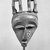 Pende (Eastern). <em>Triangular Mask Surmounted by Male and Female Figures</em>, 19th century. Wood, pigment, pyro, 15 3/4 x 6 1/2 x 3 1/4in. (40 x 16.5 x 8.3cm). Brooklyn Museum, Museum Expedition 1922, Robert B. Woodward Memorial Fund, 22.1690. Creative Commons-BY (Photo: Brooklyn Museum, 22.1690_view2_acetate_bw.jpg)