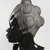 Malvina Hoffman (American, 1885–1966). <em>Martinique Woman</em>, 1928. Black Belgian marble, 22 × 14 1/4 × 15 1/4 in., 158 lb. (55.9 × 36.2 × 38.7 cm, 71.67kg). Brooklyn Museum, Dick S. Ramsay Fund, 28.384. © artist or artist's estate (Photo: Brooklyn Museum, 28.384_left_PS22.jpg)