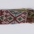 Menominee. <em>Beadwork Strip with blue, red and green wool twisted fringe</em>, 1900s. Beads, wool, 38 x 1 3/4 in.  (96.5 x 4.4 cm). Brooklyn Museum, Gift of Samuel E. Haslett, 28800. Creative Commons-BY (Photo: Brooklyn Museum, 28800_detail05_PS22.jpg)
