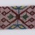 Menominee. <em>Beadwork Strip with blue, red and green wool twisted fringe</em>, 1900s. Beads, wool, 38 x 1 3/4 in.  (96.5 x 4.4 cm). Brooklyn Museum, Gift of Samuel E. Haslett, 28800. Creative Commons-BY (Photo: Brooklyn Museum, 28800_detail06_PS22.jpg)