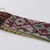 Menominee. <em>Beadwork Strip with blue, red and green wool twisted fringe</em>, 1900s. Beads, wool, 38 x 1 3/4 in.  (96.5 x 4.4 cm). Brooklyn Museum, Gift of Samuel E. Haslett, 28800. Creative Commons-BY (Photo: Brooklyn Museum, 28800_detail08_PS22.jpg)