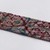 Menominee. <em>Beadwork Strip with blue, red and green wool twisted fringe</em>, 1900s. Beads, wool, 38 x 1 3/4 in.  (96.5 x 4.4 cm). Brooklyn Museum, Gift of Samuel E. Haslett, 28800. Creative Commons-BY (Photo: Brooklyn Museum, 28800_detail09_PS22.jpg)
