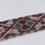 Menominee. <em>Beadwork Strip with blue, red and green wool twisted fringe</em>, 1900s. Beads, wool, 38 x 1 3/4 in.  (96.5 x 4.4 cm). Brooklyn Museum, Gift of Samuel E. Haslett, 28800. Creative Commons-BY (Photo: Brooklyn Museum, 28800_detail11_PS22.jpg)
