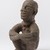  <em>Seated Male Figure</em>, 1000–1550. Volcanic stone (Andesite), 11 3/4 × 7 × 5 1/2 in. (29.8 × 17.8 × 14 cm). Brooklyn Museum, Gift of Mrs. Minor C. Keith in memory of her husband, 31.1692. Creative Commons-BY (Photo: Brooklyn Museum, 31.1692_threequarter_PS22.jpg)