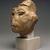  <em>Head from a Composite Statue</em>, ca. 1352-1336 B.C.E. Yellow quartzite, pigment, 7 1/16 x 5 11/16 in. (18 x 14.5 cm). Brooklyn Museum, Gift of the Egypt Exploration Society, 34.6042. Creative Commons-BY (Photo: Brooklyn Museum, 34.6042_threequarter_left_SL1.jpg)
