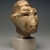 <em>Head from a Composite Statue</em>, ca. 1352-1336 B.C.E. Yellow quartzite, pigment, 7 1/16 x 5 11/16 in. (18 x 14.5 cm). Brooklyn Museum, Gift of the Egypt Exploration Society, 34.6042. Creative Commons-BY (Photo: Brooklyn Museum, 34.6042_threequarter_right_SL1.jpg)