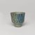  <em>Cup with Lotus Decoration</em>, ca. 1938–1539 B.C.E. Faience, 1 11/16 × Diam. 1 11/16 in. (4.3 × 4.3 cm). Brooklyn Museum, Charles Edwin Wilbour Fund, 35.1275. Creative Commons-BY (Photo: , 35.1275_PS9.jpg)