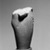  <em>Fragment of Ushabti</em>, ca. 1352-1336 B.C.E. Pink quartzite, 4 7/16 x 3 5/8 x 2 3/8 in. (11.3 x 9.2 x 6 cm). Brooklyn Museum, Charles Edwin Wilbour Fund, 35.1874. Creative Commons-BY (Photo: Brooklyn Museum, 35.1874_right_bw.jpg)