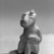  <em>Seated Figure</em>. Stone, 5 × 2 1/2 × 3 in. (12.7 × 6.4 × 7.6 cm). Brooklyn Museum, Carll H. de Silver Fund, 36.609. Creative Commons-BY (Photo: Brooklyn Museum, 36.609_acetate_bw.jpg)