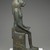  <em>Seated Wadjet</em>, 664–343 B.C.E. Bronze, animal remains, 21 1/4 × 5 1/16 × 9 9/16 in. (54 × 12.9 × 24.3 cm). Brooklyn Museum, Charles Edwin Wilbour Fund, 36.622. Creative Commons-BY (Photo: Brooklyn Museum, 36.622_profile_right_PS2.jpg)