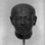  <em>High Priest as King (?)</em>, ca. 1070-945 B.C.E. Quartzite, 4 7/16 x 2 7/8 x 3 1/4 in. (11.3 x 7.3 x 8.3 cm). Brooklyn Museum, Charles Edwin Wilbour Fund, 36.835. Creative Commons-BY (Photo: Brooklyn Museum, 36.835_bw_SL1.jpg)