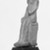  <em>Amulet of the Child Horus</em>, 664-30 B.C.E. Faience, 1 11/16 × 7/16 × 11/16 in. (4.3 × 1.1 × 1.8 cm). Brooklyn Museum, Charles Edwin Wilbour Fund, 37.1091E. Creative Commons-BY (Photo: Brooklyn Museum, 37.1091E_GRP-A_glass_bw_SL1.jpg)