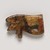  <em>Wadjet-eye Amulet</em>, ca. 1539-1075 B.C.E. Schist (probably), 7/8 x 1 7/16 x 1/4 in. (2.3 x 3.6 x 0.6 cm). Brooklyn Museum, Charles Edwin Wilbour Fund, 37.1287E. Creative Commons-BY (Photo: Brooklyn Museum, 37.1287E_bottom_PS20.jpg)
