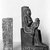  <em>Isis Nursing the Child Horus</em>, ca. 664-525 B.C.E. Slate, 7 1/2 x 1 5/8 x 4 1/4 in. (19.1 x 4.1 x 10.8 cm). Brooklyn Museum, Charles Edwin Wilbour Fund, 37.938E. Creative Commons-BY (Photo: , 37.1603E_37.938E_GRPA_glass_bw_SL4.jpg)