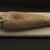 <em>Ibis Mummy</em>, 664-332 B.C.E. Animal remains, linen, cartonnage, pigment, 23 × 7 × 4 in. (58.4 × 17.8 × 10.2 cm). Brooklyn Museum, Charles Edwin Wilbour Fund, 37.1986E. Creative Commons-BY (Photo: Brooklyn Museum, 37.1986E_threequarter_PS2.jpg)