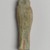  <em>Ushabti of Yuf-o</em>, 664-343 B.C.E. Faience, 3 9/16 x 7/8 x 1/2 in. (9 x 2.3 x 1.3 cm). Brooklyn Museum, Charles Edwin Wilbour Fund, 37.236E. Creative Commons-BY (Photo: Brooklyn Museum, 37.236E_back_PS2.jpg)