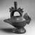 Lambayeque. <em>Stirrup Spout Vessel in Form of Bird</em>. Ceramic, black slip, 7 1/2 x 8 x 4 1/2 in. (19.1 x 20.3 x 11.4 cm). Brooklyn Museum, Frank Sherman Benson Fund and the Henry L. Batterman Fund, 37.2562PA. Creative Commons-BY (Photo: Brooklyn Museum, 37.2562PA_bw.jpg)