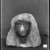  <em>Head of a Woman Wearing an Elaborate Wig</em>, ca. 1352-1190 B.C.E. Limestone, pigment, 6 3/4 × 4 3/4 × 7 1/4 in. (17.1 × 12.1 × 18.4 cm). Brooklyn Museum, Charles Edwin Wilbour Fund, 37.256E. Creative Commons-BY (Photo: Brooklyn Museum, 37.256E_NegB_SL4.jpg)