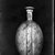  <em>Pilgrim Flask</em>, 664-332 B.C.E. Faience, 7 7/8 × 6 1/8 × 4 1/16 in. (20 × 15.5 × 10.3 cm). Brooklyn Museum, Charles Edwin Wilbour Fund, 37.336E. Creative Commons-BY (Photo: Brooklyn Museum, 37.336E_NegD_SL4.jpg)