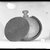  <em>Pilgrim Flask Enclosed in a Basket</em>, 664-332 B.C.E. Faience, fibers (esparto, probably), 6 11/16 × 4 3/4 in. (17 × 12 cm). Brooklyn Museum, Charles Edwin Wilbour Fund, 37.338E. Creative Commons-BY (Photo: Brooklyn Museum, 37.338E_NegF_SL4.jpg)